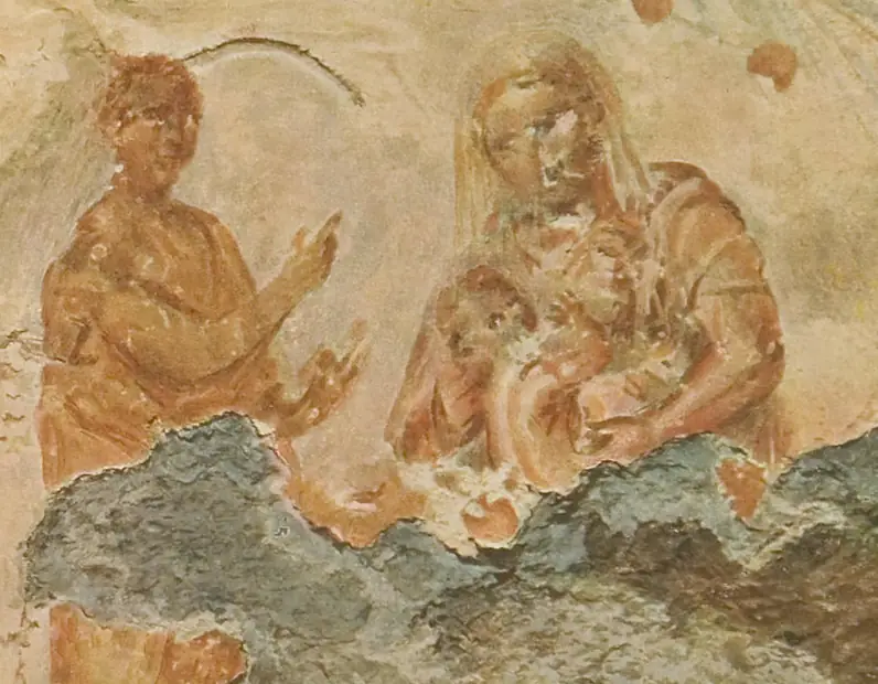 Verblasste Wandmalerei in Rotbraun: Rechts sitzt Maria und hält das Kind auf dem Schoß, links steht ein Mann, meist als Prophet gedeutet, und weist mit der Hand nach oben.